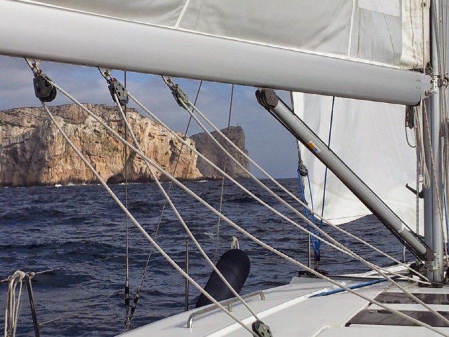 Capo caccia cliffs by sail